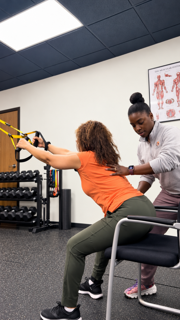 woman doing back exercise at Performance edge PT in Livonia, MI